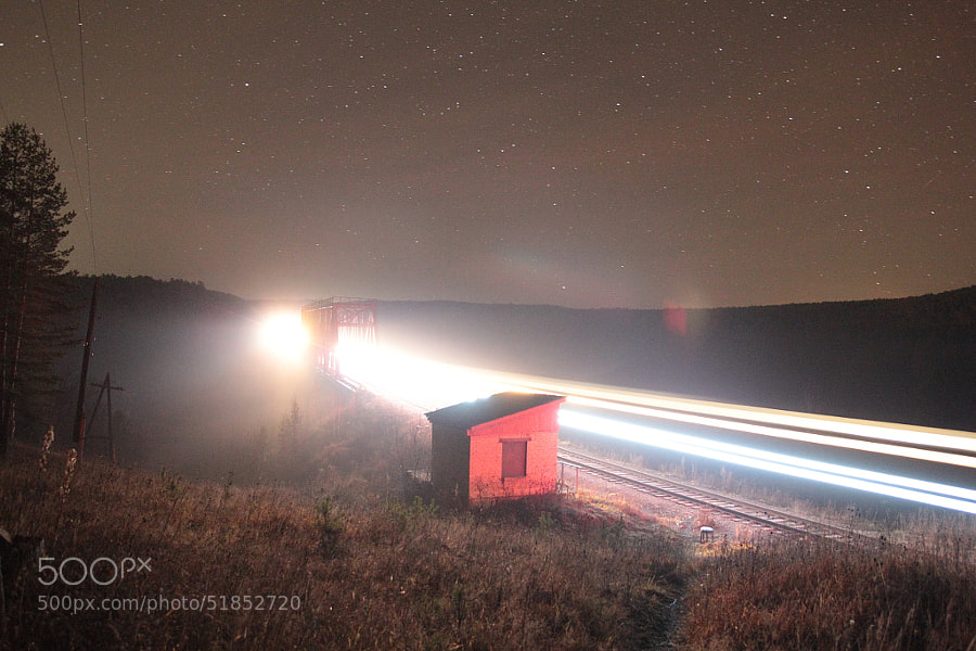 Photograph Train on the bridge under stars by Maxim Tashkinov on 500px