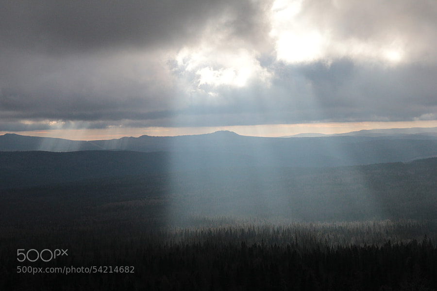 rays through the clouds by Maxim Tashkinov on 500px.com