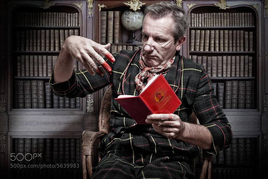 Photograph Reading "The little Red book" (Mao Tze Dong) by Pierre Beteille on 500px