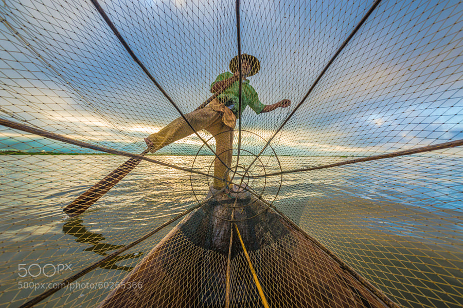 Photograph Fish Hunter also known as Leg Rower by Zay Yar Lin on 500px