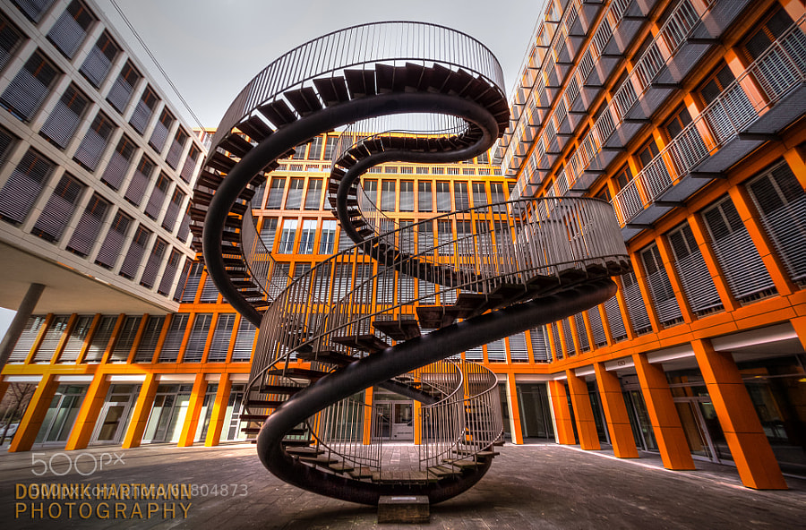 Photograph endless stairs munich by Dominik Hartmann on 500px